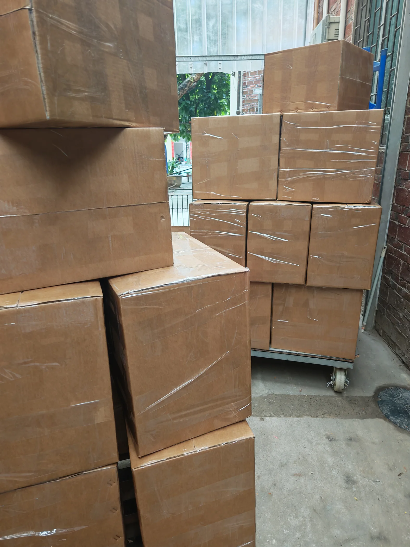 Sealed cartons staged for dispatch at the WanHu warehouse